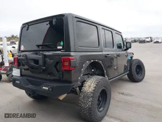 2019 Jeep Wrangler Unlimited Sport with VIN 1C4HJXDG9KW558672, listed as a IAAI auction lot 41218292 with 61,057 mi miles. Bid and sale history available at carsss.com. Image 4.
