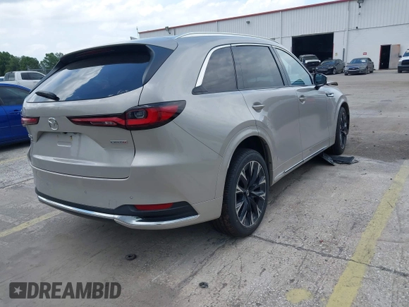 2024 Mazda CX-90 S с VIN JM3KK1HC0R1135680, выставлен на аукционе IAAI как лот 42492399 с пробегом 38 940 миль миль и . История ставок и продаж доступна на DreamBid. Изображение 4.