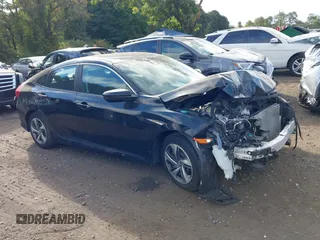 2019 Honda Civic LX with VIN 2HGFC2F65KH549993, listed as a IAAI auction lot 40394538 with 92,951 mi miles and . Bid and sale history available at DreamBid. Image 13.