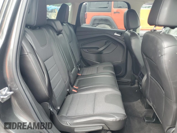 2016 Ford Escape SE z VIN 1FMCU9G95GUC33848, wystawiony jako Copart lot #58191925 z przebiegiem 108 194 mil mil oraz Szkoda całkowita • Salvage title. Historia ofert i sprzedaży dostępna na DreamBid. Obrazek 11.