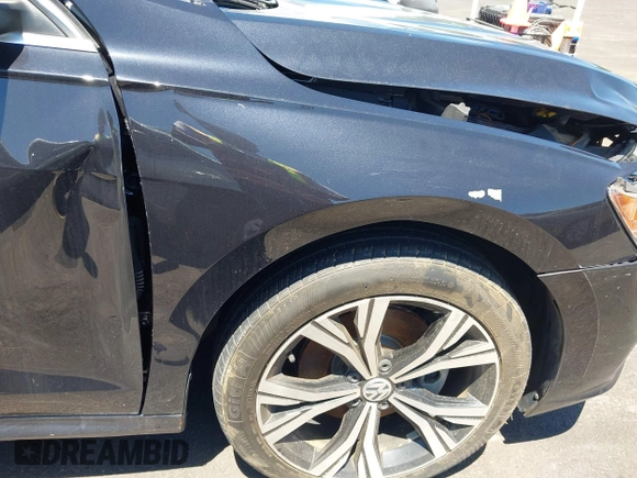 2021 Volkswagen Passat SE z VIN 1VWSA7A30MC003988, wystawiony jako IAAI lot #42238431 z przebiegiem 43 208 mil mil oraz . Historia ofert i sprzedaży dostępna na DreamBid. Obrazek 21.