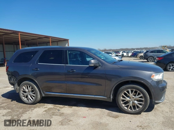 2016 Dodge Durango Limited with VIN 1C4RDJDG9GC433365, listed as a IAAI auction lot 41751149 with 199,547 mi miles and . Bid and sale history available at DreamBid. Image 13.