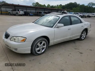 2001 Mazda Millenia with VIN JM1TA221911717066, listed as a Copart auction lot 63341244 with 234,263 mi miles and Salvage Title. Bid and sale history available at DreamBid. Image 1.