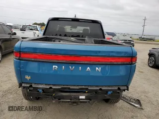 2023 Rivian R1T Launch Edition with VIN 7FCTGAAL7PN019188, listed as a Copart auction lot 55100405 with 13,654 mi miles and Salvage Title. Bid and sale history available at DreamBid. Image 6.
