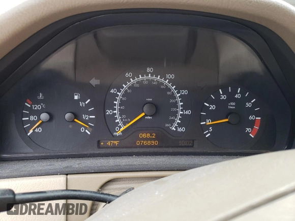 1999 Mercedes-Benz E-Class with VIN WDBJF82H2XX015586, listed as a Copart auction lot 44465455 with 76,890 mi miles and Salvage Title. Bid and sale history available at carsss.com. Image 9.