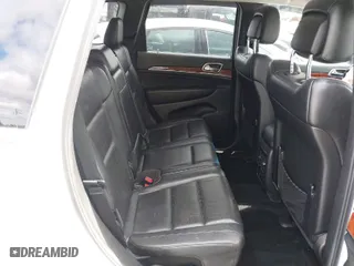2013 Jeep Grand Cherokee Limited with VIN 1C4RJFBT0DC619216, listed as a IAAI auction lot 41703137 with 142,577 mi miles. Bid and sale history available at carsss.com. Image 8.