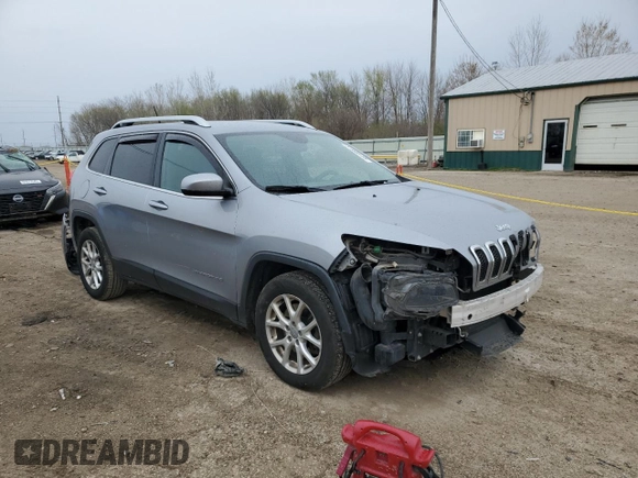 2014 Jeep Cherokee Latitude with VIN 1C4PJLCS5EW169008, listed as a Copart auction lot 51999135 with 180,153 mi miles and Salvage Title. Bid and sale history available at DreamBid. Image 4.