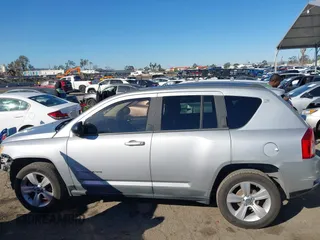 2011 Jeep Compass with VIN 1J4NT1FA4BD139153, listed as a IAAI auction lot 41665481 with 164,412 mi miles. Bid and sale history available at carsss.com. Image 15.
