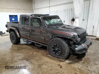 2023 Jeep Gladiator Mojave with VIN 1C6JJTEG4PL575386, listed as a Copart auction lot 45464735 with 17,572 mi miles and Salvage title. Bid and sale history available at DreamBid. Image 4.