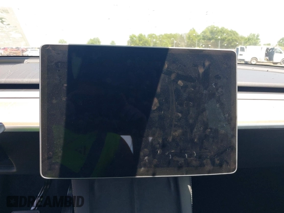 2023 Tesla Model Y Long Range z VIN 7SAYGDEE9PF753051, wystawiony jako IAAI lot #39615839 z przebiegiem Nie podano mil oraz . Historia ofert i sprzedaży dostępna na DreamBid. Obrazek 16.
