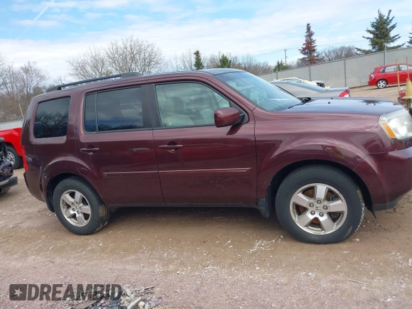 2011 Honda Pilot EX-L with VIN 5FNYF4H58BB001023, listed as a IAAI auction lot 42081793 with 171,062 mi miles and . Bid and sale history available at carsss.com. Image 13.