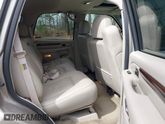 2002 Cadillac Escalade z VIN 1GYEK63N52R236906, wystawiony jako IAAI lot #41877028 z przebiegiem 185 348 mil mil oraz . Historia ofert i sprzedaży dostępna na DreamBid. Obrazek 8.