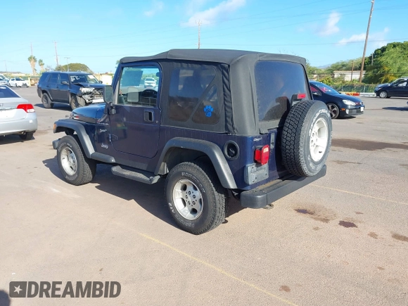 2002 Jeep Wrangler Sport z VIN 1J4FA49SX2P760671, wystawiony jako IAAI lot #41861841 z przebiegiem 125 728 mil mil oraz . Historia ofert i sprzedaży dostępna na DreamBid. Obrazek 3.