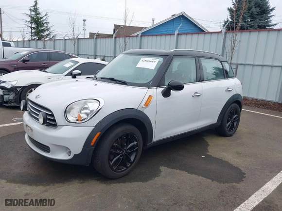 2011 MINI Cooper Countryman with VIN WMWZB3C54BWM01011, listed as a IAAI auction lot 41809669 with 1 mi miles. Bid and sale history available at carsss.com. Image 2.