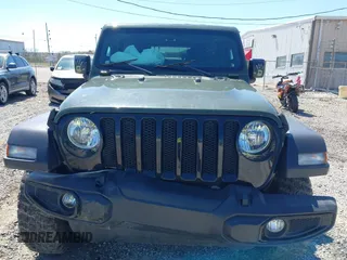 2021 Jeep Wrangler Unlimited Sport S with VIN 1C4HJXDG5MW804748, listed as a IAAI auction lot 41878895 with 35,839 mi miles and . Bid and sale history available at DreamBid. Image 12.