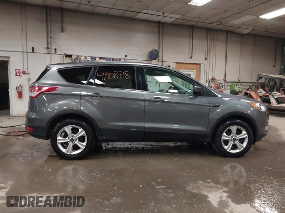 2014 Ford Escape SE with VIN 1FMCU9G9XEUD69423, listed as a IAAI auction lot 41908718 with 65,149 mi miles. Bid and sale history available at carsss.com. Image 13.