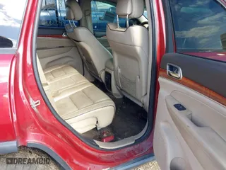 2011 Jeep Grand Cherokee Overland with VIN 1J4RR6GT9BC652336, listed as a IAAI auction lot 42028574 with 223,253 mi miles. Bid and sale history available at carsss.com. Image 8.