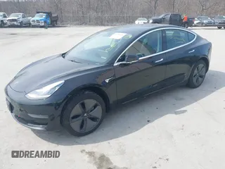 2020 Tesla Model 3 Standard Range Plus with VIN 5YJ3E1EAXLF643807, listed as a IAAI auction lot 41789406 with 49,256 mi miles. Bid and sale history available at carsss.com. Image 18.