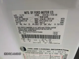 2013 Ford F-150 XL with VIN 1FTFW1ET7DKD70468, listed as a IAAI auction lot 40952588 with 208,052 mi miles. Bid and sale history available at carsss.com. Image 9.