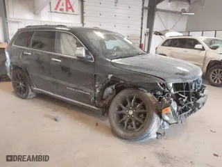 2015 Jeep Grand Cherokee Summit with VIN 1C4RJFJG8FC943716, listed as a IAAI auction lot 41386081 with 56,485 mi miles. Bid and sale history available at carsss.com. Image 1.