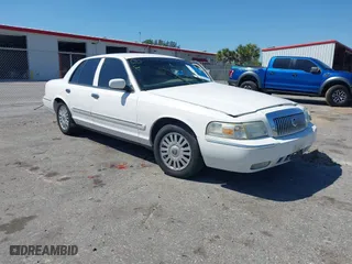 2007 Mercury Grand Marquis LS with VIN 2MEFM75VX7X623356, listed as a IAAI auction lot 41783361 with 157,921 mi miles. Bid and sale history available at carsss.com. Image 1.