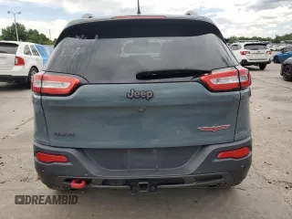 2015 Jeep Cherokee Trailhawk с VIN 1C4PJMBSXFW555223, выставлен на аукционе Copart как лот 62072235 с пробегом 207 240 миль миль и На запчасти • Non repairable. История ставок и продаж доступна на DreamBid. Изображение 6.