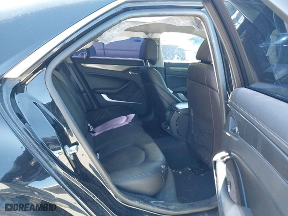 2011 Cadillac CTS Sedan with VIN 1G6DA5EY4B0157420, listed as a IAAI auction lot 41734450 with 107,875 mi miles. Bid and sale history available at carsss.com. Image 8.