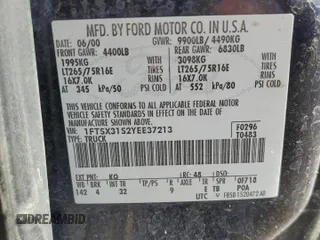 2000 Ford F-350 XL with VIN 1FTSX31S2YEE37213, listed as a Copart auction lot 54300595 with 141,273 mi miles and Clean title. Bid and sale history available at DreamBid. Image 12.