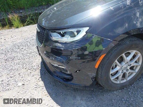 2023 Chrysler Pacifica Touring L with VIN 2C4RC1BG2PR534194, listed as a IAAI auction lot 42613934 with 69,896 mi miles and . Bid and sale history available at DreamBid. Image 17.
