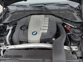 2010 BMW X5 35d with VIN 5UXFF0C53ALT76559, listed as a IAAI auction lot 40622982 with 134,821 mi miles. Bid and sale history available at carsss.com. Image 6.