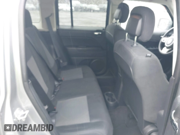 2015 Jeep Patriot High Altitude with VIN 1C4NJRFB2FD292056, listed as a IAAI auction lot 42016017 with 80,462 mi miles and . Bid and sale history available at carsss.com. Image 8.