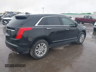 2017 Cadillac XT5 FWD with VIN 1GYKNARS0HZ317508, listed as a IAAI auction lot 40818768 with 132,598 mi miles. Bid and sale history available at carsss.com. Image 4.