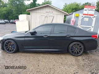 2018 BMW 5 Series M550i xDrive with VIN WBAJB9C5XJB286923, listed as a IAAI auction lot 42527301 with 76,923 mi miles and . Bid and sale history available at DreamBid. Image 14.