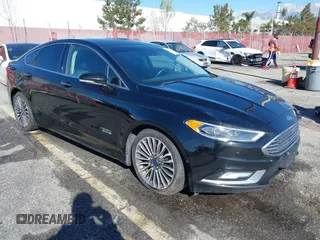 2017 Ford Fusion Titanium with VIN 3FA6P0SU1HR116976, listed as a IAAI auction lot 39028290 with 86,678 mi miles and . Bid and sale history available at carsss.com. Image 1.