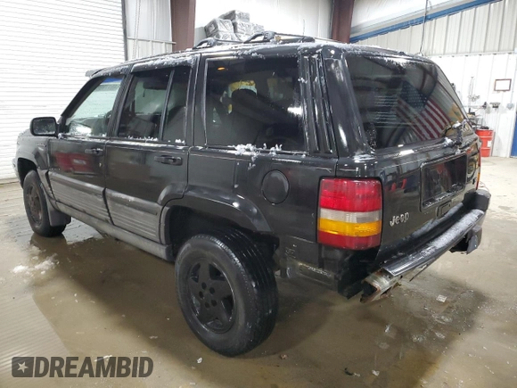 1995 Jeep Grand Cherokee Laredo with VIN 1J4GZ58Y5SC565187, listed as a Copart auction lot 45179985 with 122,863 mi miles and Salvage Title. Bid and sale history available at carsss.com. Image 2.