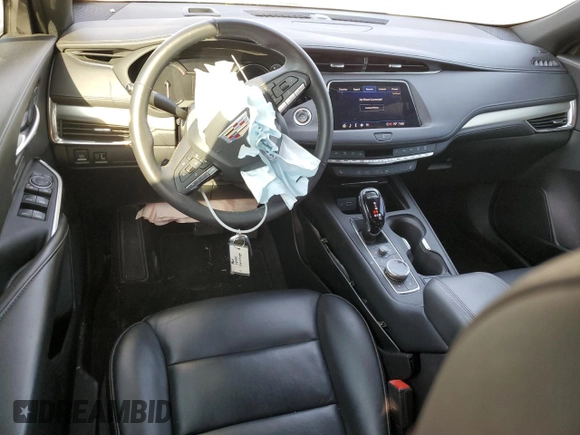 2022 Cadillac XT4 FWD Premium Luxury z VIN 1GYFZCR44NF151123, wystawiony jako Copart lot #50312745 z przebiegiem 46 820 mil mil oraz Szkoda całkowita • Salvage title. Historia ofert i sprzedaży dostępna na DreamBid. Obrazek 8.