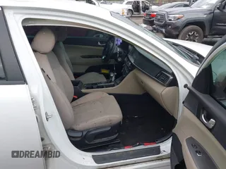 2018 Kia Optima S with VIN 5XXGT4L36JG265878, listed as a IAAI auction lot 42302801 with 101,927 mi miles and . Bid and sale history available at DreamBid. Image 5.