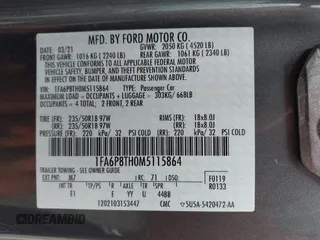 2021 Ford Mustang EcoBoost with VIN 1FA6P8TH0M5115864, listed as a IAAI auction lot 42287791 with 94,842 mi miles and . Bid and sale history available at DreamBid. Image 9.