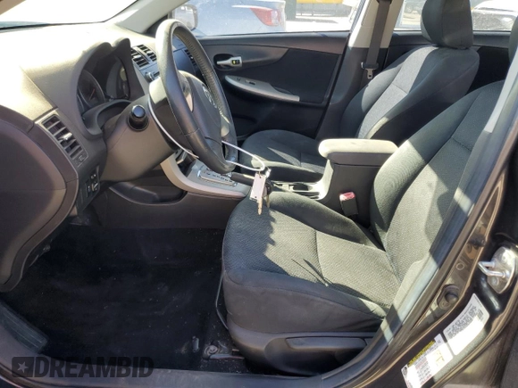 2010 Toyota Corolla with VIN 1NXBU4EE0AZ349836, listed as a Copart auction lot 48857815 with 157,773 mi miles and Salvage Title. Bid and sale history available at DreamBid. Image 7.