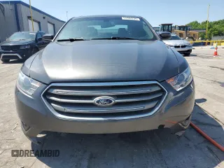 2015 Ford Taurus SEL z VIN 1FAHP2E83FG125234, wystawiony jako Copart lot #54404745 z przebiegiem 107 311 mil mil oraz Szkody całkowita. Historia ofert i sprzedaży dostępna na DreamBid. Obrazek 5.