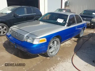1999 Ford Crown Victoria Police with VIN 2FAFP71W5XX192230, listed as a IAAI auction lot 41629743 with 170,510 mi miles. Bid and sale history available at carsss.com. Image 2.
