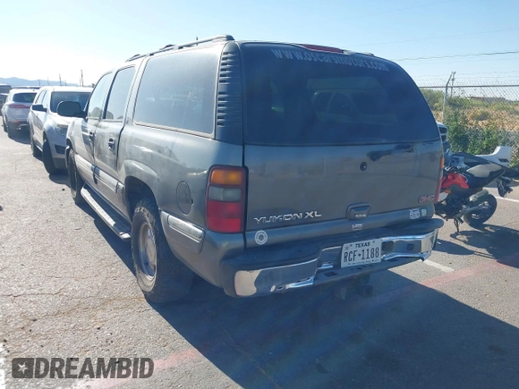 2002 GMC Yukon XL SLT z VIN 1GKFK16Z12J180669, wystawiony jako IAAI lot #42317437 z przebiegiem 168 827 mil mil oraz . Historia ofert i sprzedaży dostępna na DreamBid. Obrazek 3.