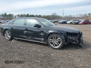 2015 Audi A8 3.0T with VIN WAU3GAFD3FN033317, listed as a IAAI auction lot 41854277 with 81,862 mi miles and . Bid and sale history available at DreamBid. Image 13.