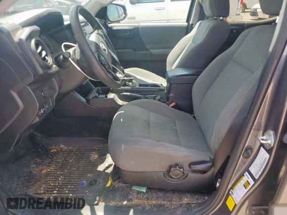 2021 Toyota Tacoma SR with VIN 3TYAX5GN8MT018185, listed as a Copart auction lot 59977895 with 68,149 mi miles and Salvage title. Bid and sale history available at DreamBid. Image 7.