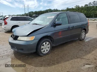 2003 Honda Odyssey EX-L with VIN 5FNRL18933B116127, listed as a Copart auction lot 56013645 with 157,118 mi miles and Salvage Title. Bid and sale history available at DreamBid. Image 1.