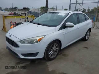 2016 Ford Focus SE with VIN 1FADP3F24GL346445, listed as a IAAI auction lot 42101322 with 30,354 mi miles. Bid and sale history available at carsss.com. Image 2.