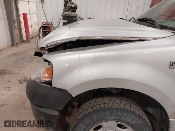 2007 Ford F-150 XLT с VIN 1FTPX14V77FA61813, выставлен на аукционе IAAI как лот 42034381 с пробегом 196 245 миль миль и . История ставок и продаж доступна на DreamBid. Изображение 13.