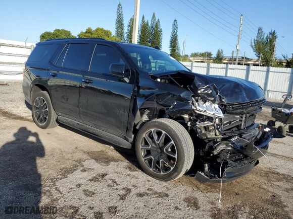 2023 Chevrolet Tahoe RST with VIN 1GNSCRKDXPR483465, listed as a Copart auction lot 77744604 with 11,078 mi miles and Salvage Title. Bid and sale history available at carsss.com. Image 4.