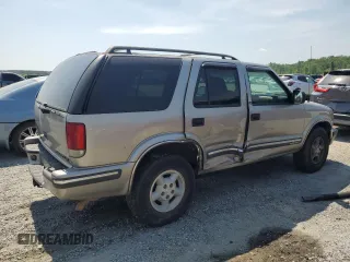 1999 Chevrolet Blazer Trailblazer z VIN 1GNDT13W1X2169254, wystawiony jako Copart lot #55021105 z przebiegiem 158 169 mil mil oraz Szkody całkowita. Historia ofert i sprzedaży dostępna na DreamBid. Obrazek 3.