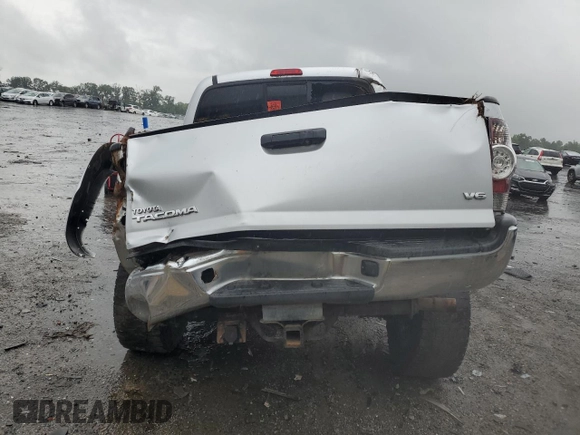 2013 Toyota Tacoma with VIN 5TFLU4EN8DX065656, listed as a Copart auction lot 63486165 with 185,018 mi miles and Salvage title. Bid and sale history available at DreamBid. Image 6.